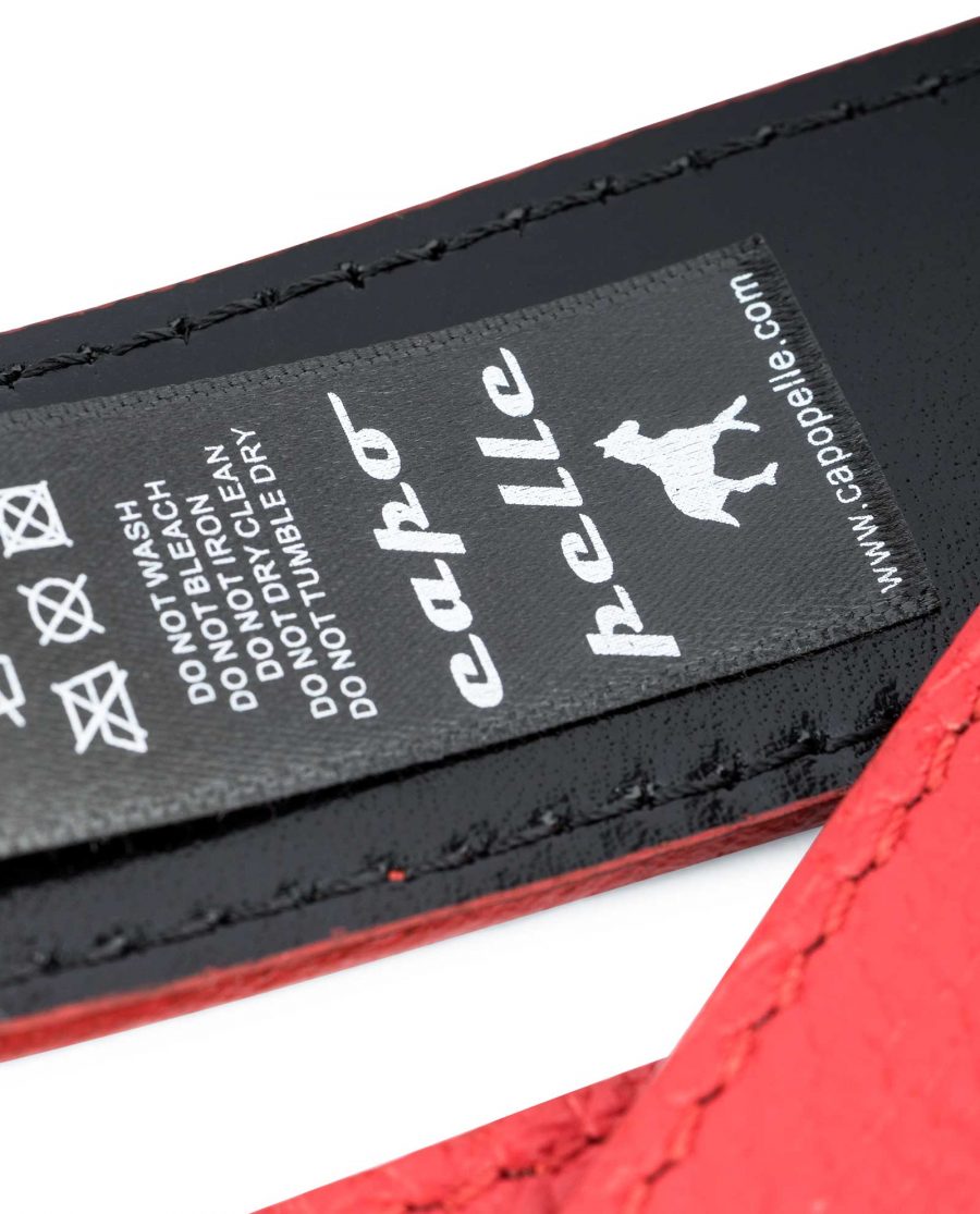 Red-Reversible-Belt-with-Twist-Buckle-Care-label