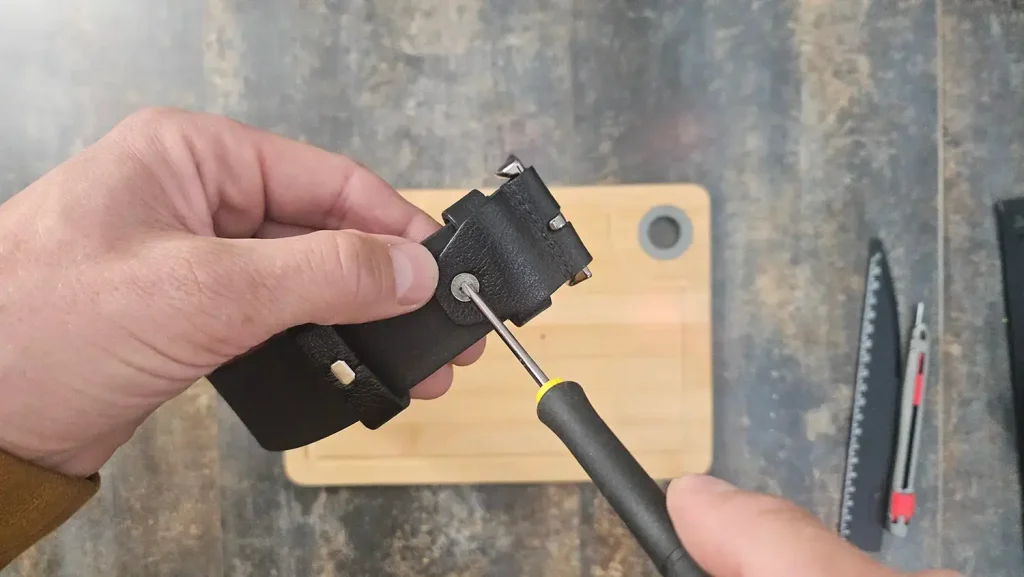 Step 2 Unscrew the Buckle and Remove Loops